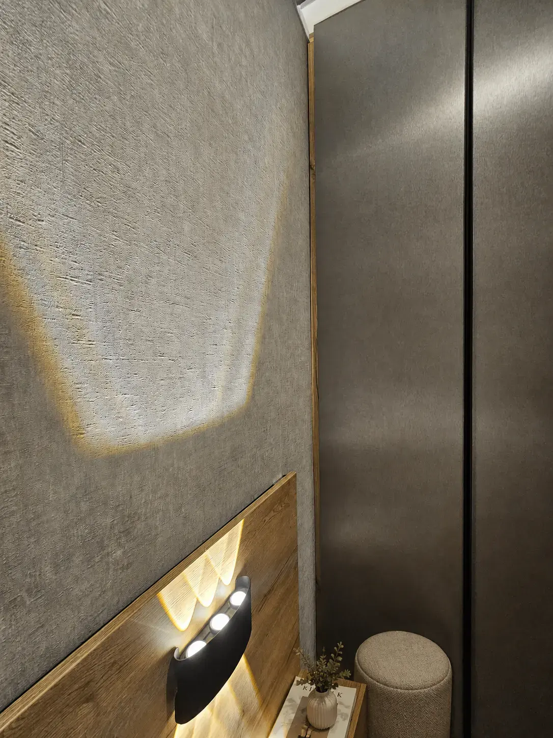 Aplique de luz sobre cabecero de madera y pared texturizada